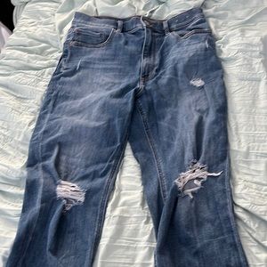 Blue jeans with rips from express